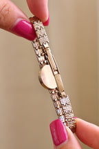 1980s Vintage 9ct Yellow Gold Sovereign quartz dress watch with an oval case and a textured link bracelet