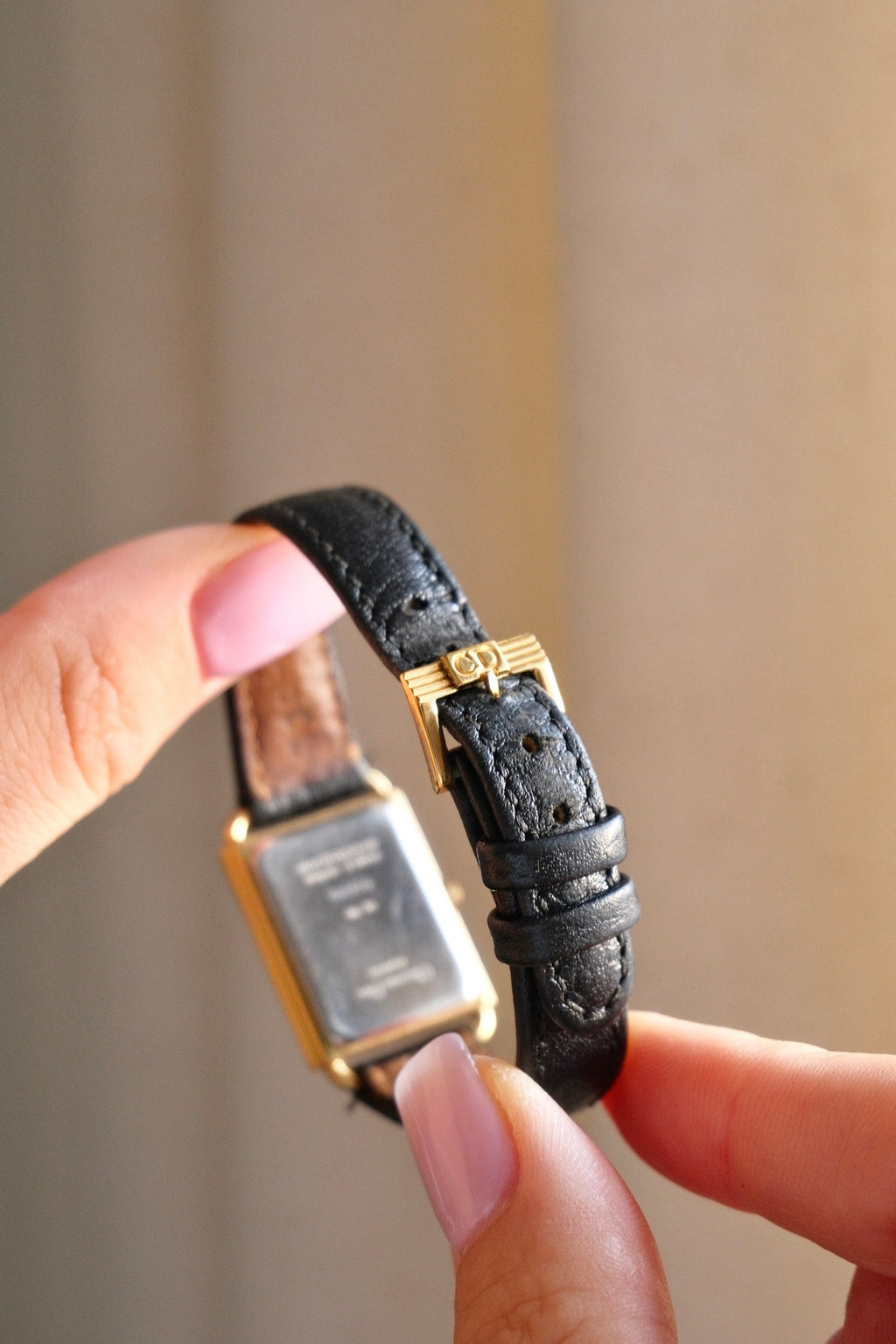 Rare ladies' Christian Dior 90s watch with tank-style rectangular dial, and black leather strap