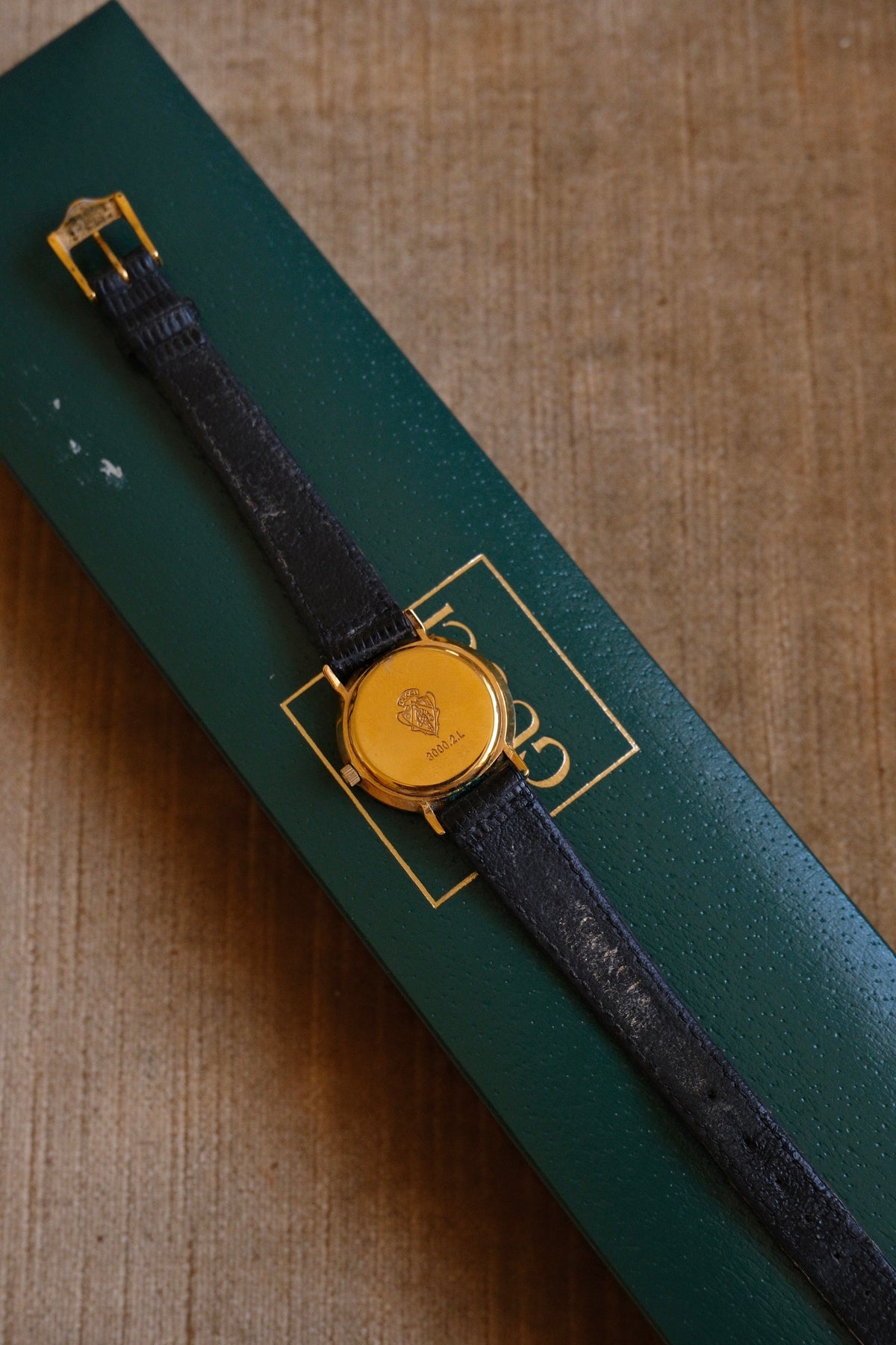 90s Ladies Gold-Plated Gucci 3000L Quartz Watch with Black Leather Strap in Box
