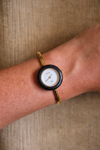 Vintage Gucci 1100L Gold Plated Interchangeable Watch with Black Bezel White Dial