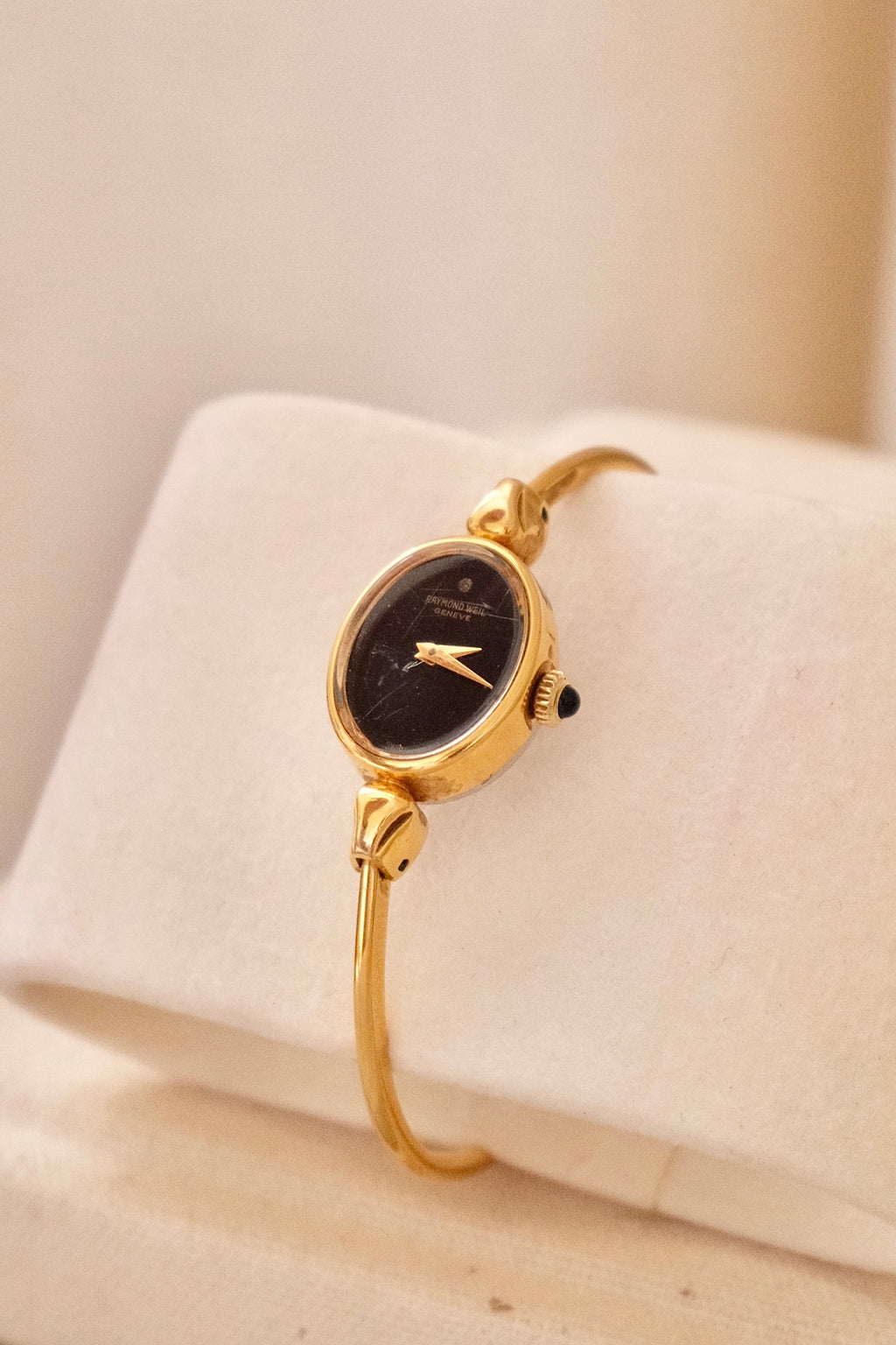 1970s Ladies Gold Plated Raymond Weil Bangle Watch Oval Black Dial Manual Wind