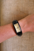 Rare 1970s Hanowa Mage Swiss-made ladies bangle watch featuring a rectangular gold-tone dial Manual Wind