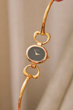 90s Vintage Ladies Gucci 1600 Horsebit Black Dial Bangle Style Watch