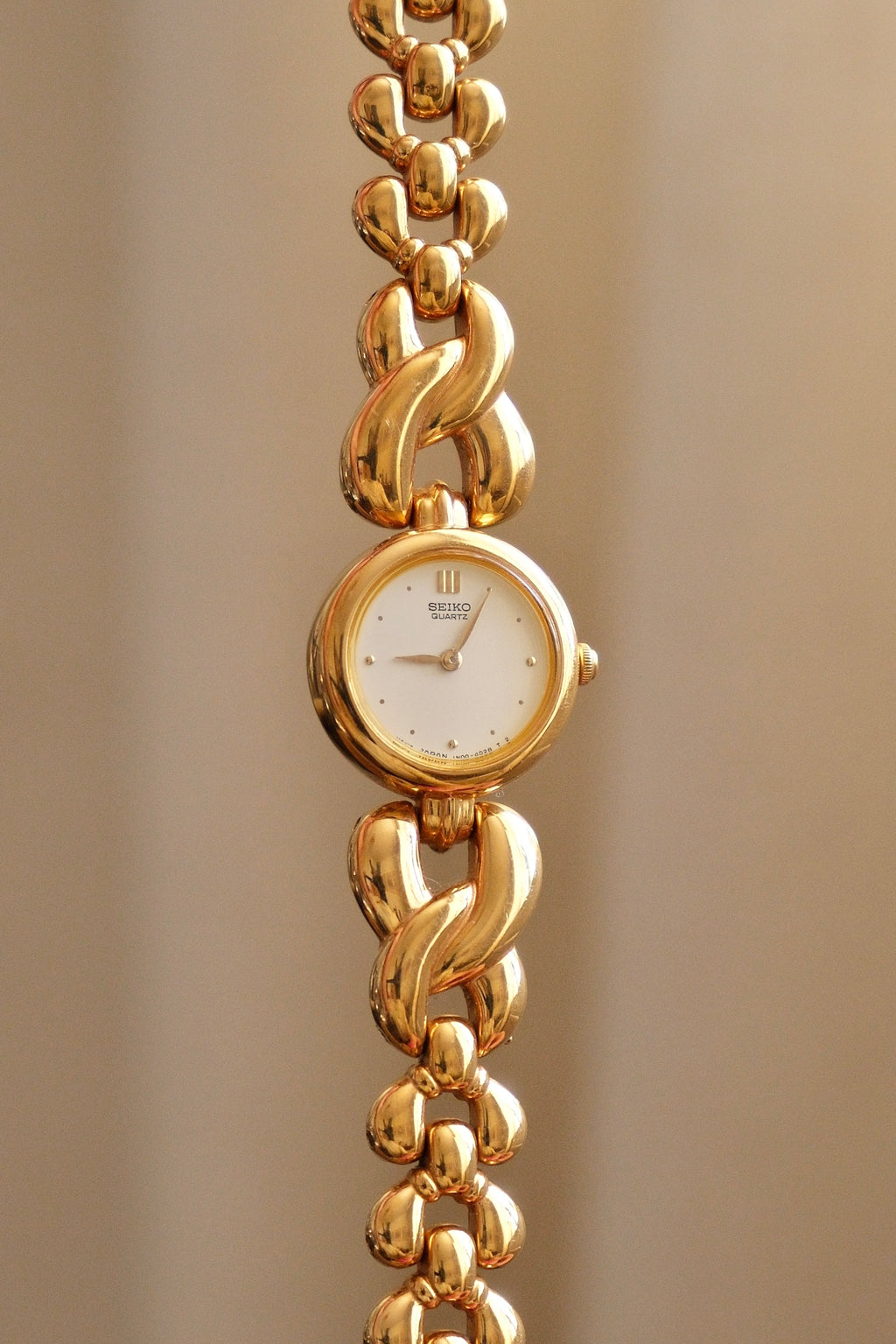 Vintage Ladies Gold Seiko Quartz Watch Featuring a Striking Chunky Intertwined Link Bracelet