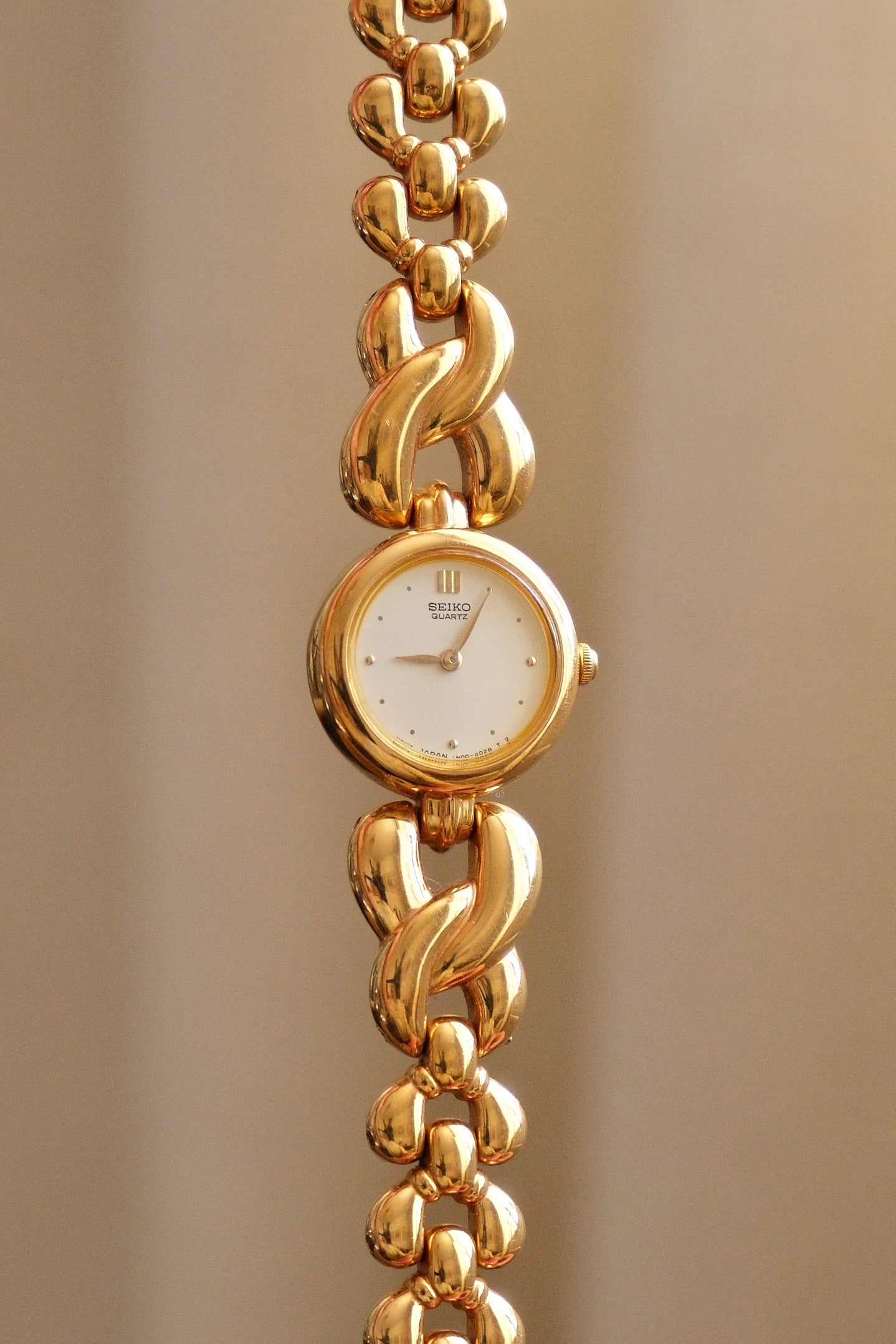 Vintage Ladies Gold Seiko Quartz Watch Featuring a Striking Chunky Intertwined Link Bracelet