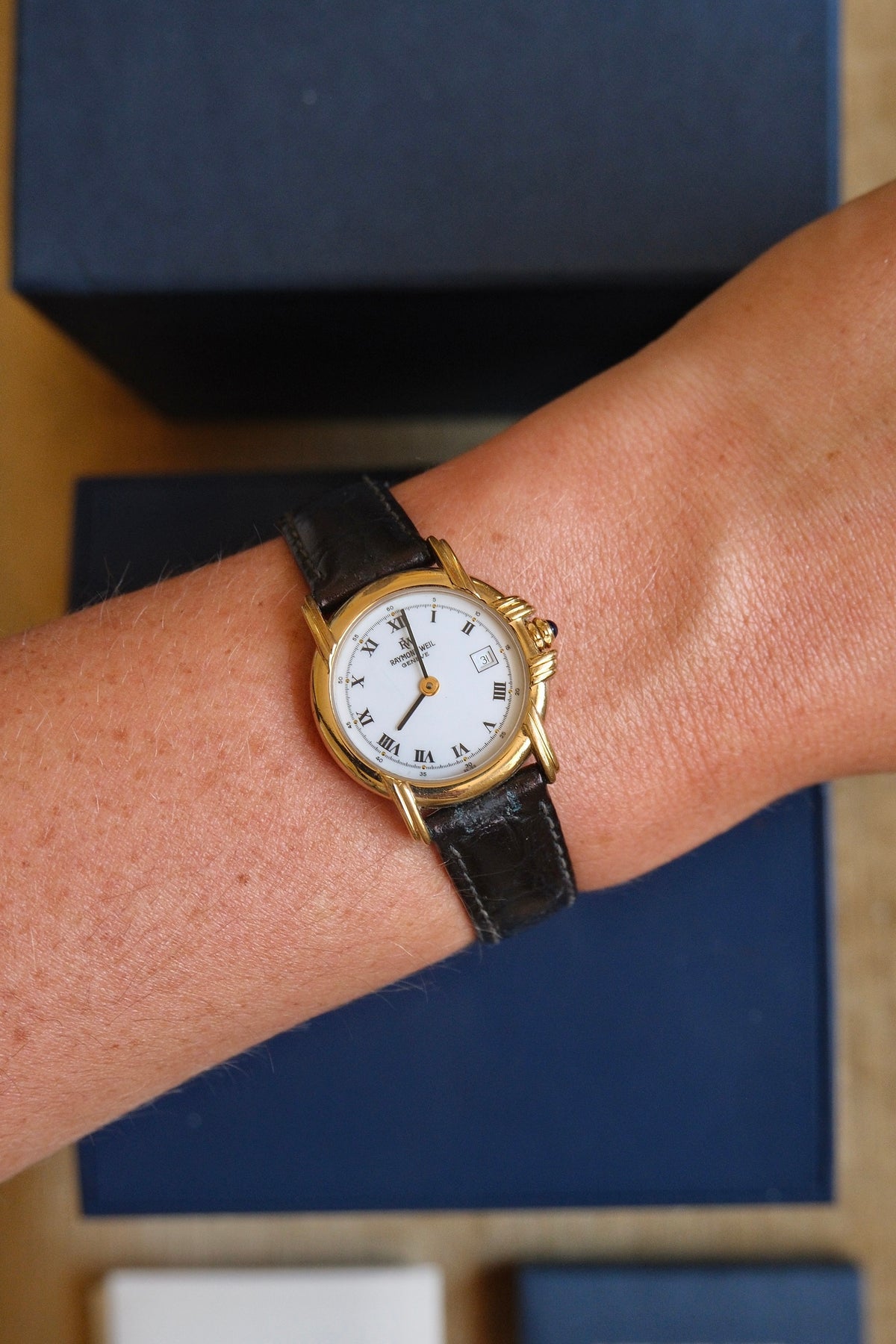 Ladies Raymond Weil Vintage Genève 9955 18k Gold Plated Quartz Watch With Authentic  Blue Cabochon Sapphire Crown with Box and Papers