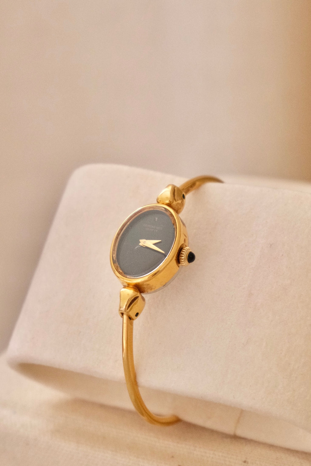 1970s Ladies Gold Plated Raymond Weil Bangle Watch Oval Black Dial Manual Wind