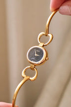 90s Vintage Ladies Gucci 1600 Horsebit Black Dial Bangle Style Watch