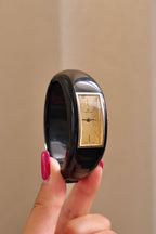 Rare 1970s Hanowa Mage Swiss-made ladies bangle watch featuring a rectangular gold-tone dial Manual Wind