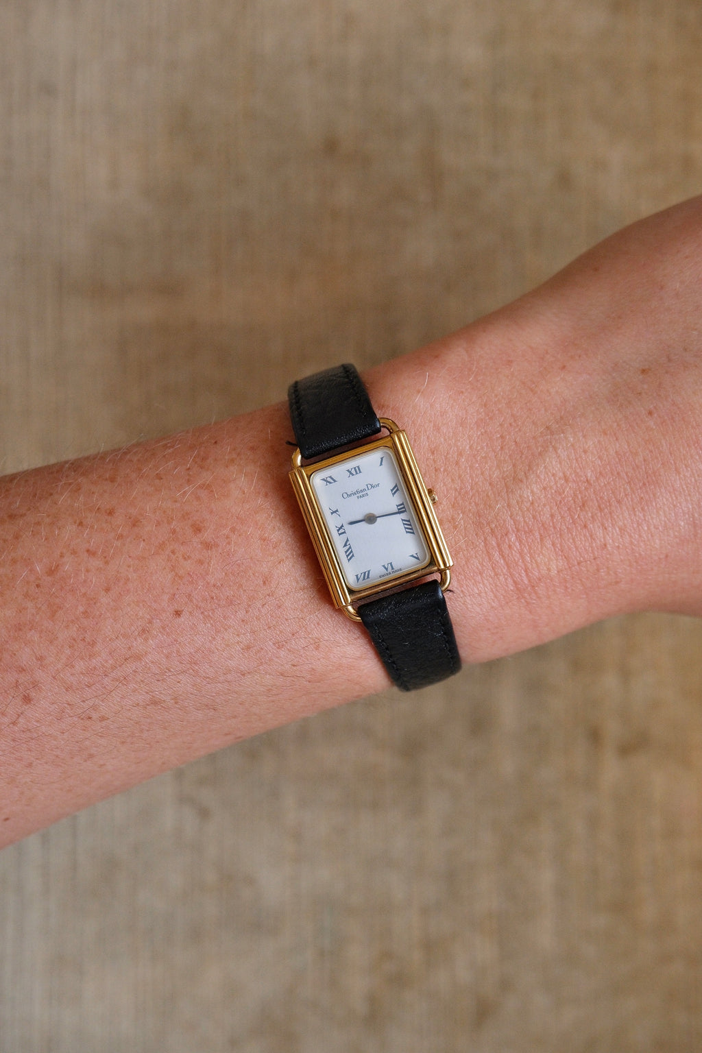 Rare ladies' Christian Dior 90s watch with tank-style rectangular dial, and black leather strap