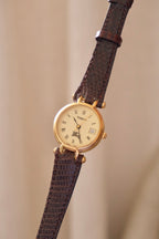 1994 Ladies Burberrys Gold Tone Round Watch with Date Brown Lizard Strap