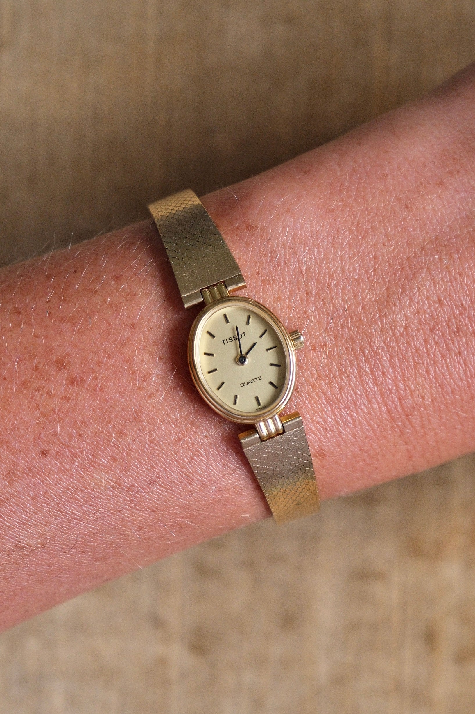 Vintage 1980s Tissot Ladies Gold Oval Watch - Swiss Quartz Cocktail Dress Wristwatch with Integrated Mesh Pattern Mesh Bracelet