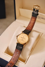 Ladies Raymond Weil Vintage Genève 9955 18k Gold Plated Quartz Watch With Authentic  Blue Cabochon Sapphire Crown with Box and Papers
