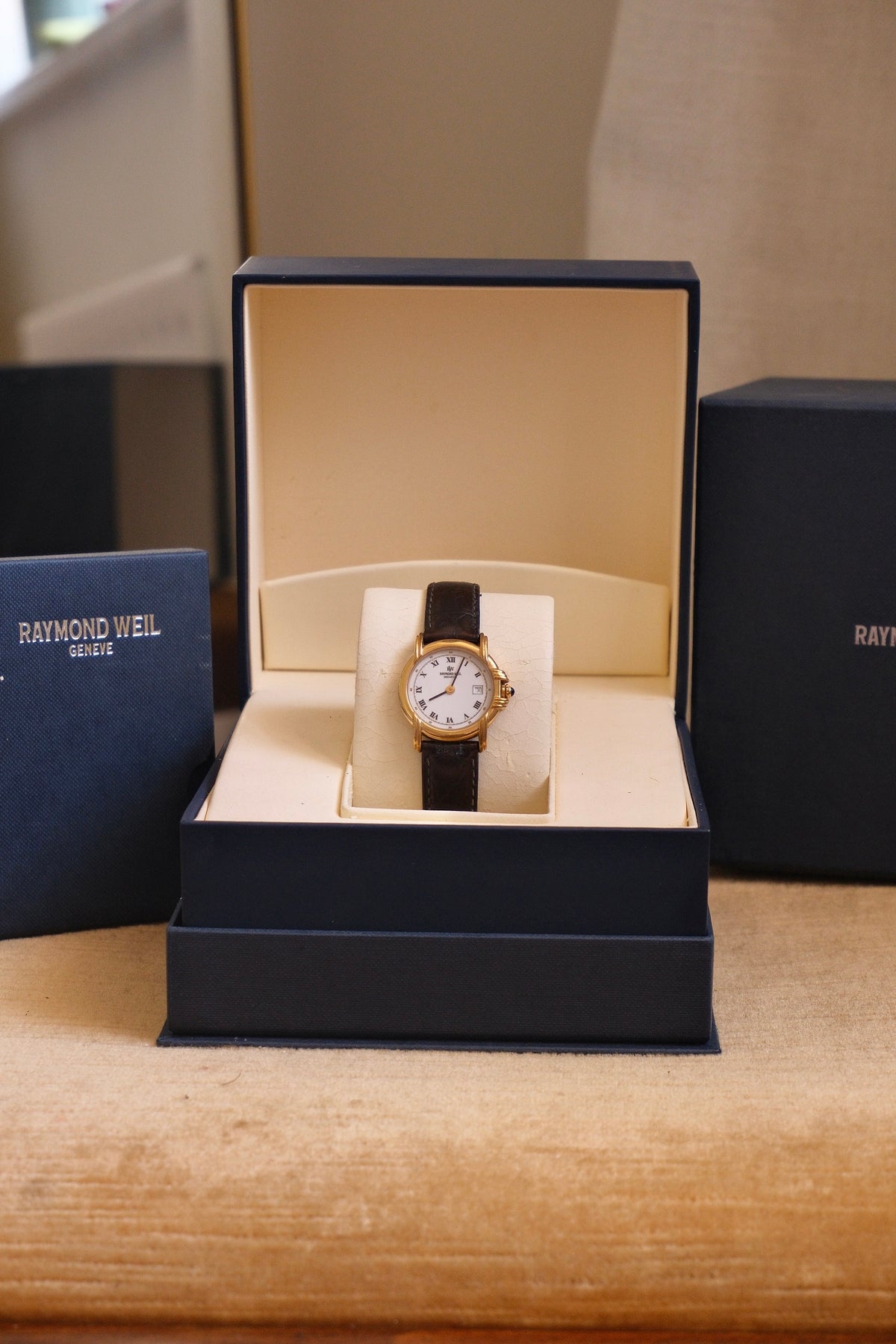 Ladies Raymond Weil Vintage Genève 9955 18k Gold Plated Quartz Watch With Authentic  Blue Cabochon Sapphire Crown with Box and Papers