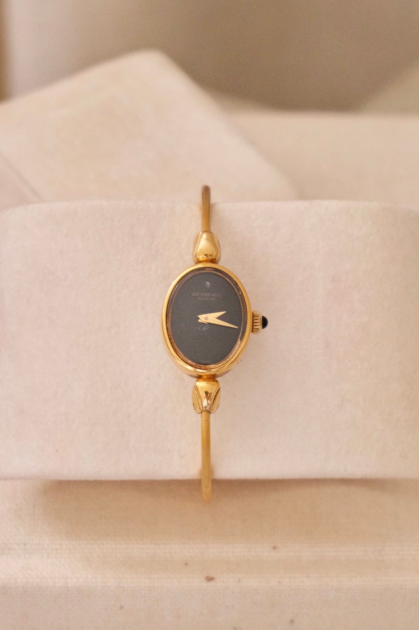 1970s Ladies Gold Plated Raymond Weil Bangle Watch Oval Black Dial Manual Wind