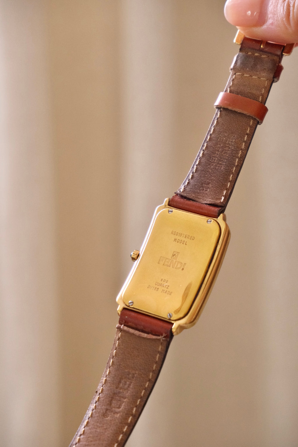 Vintage 90s Unisex Gold-Plated Fendi 500 Quartz Watch with Rectangular Tank-Style Dial