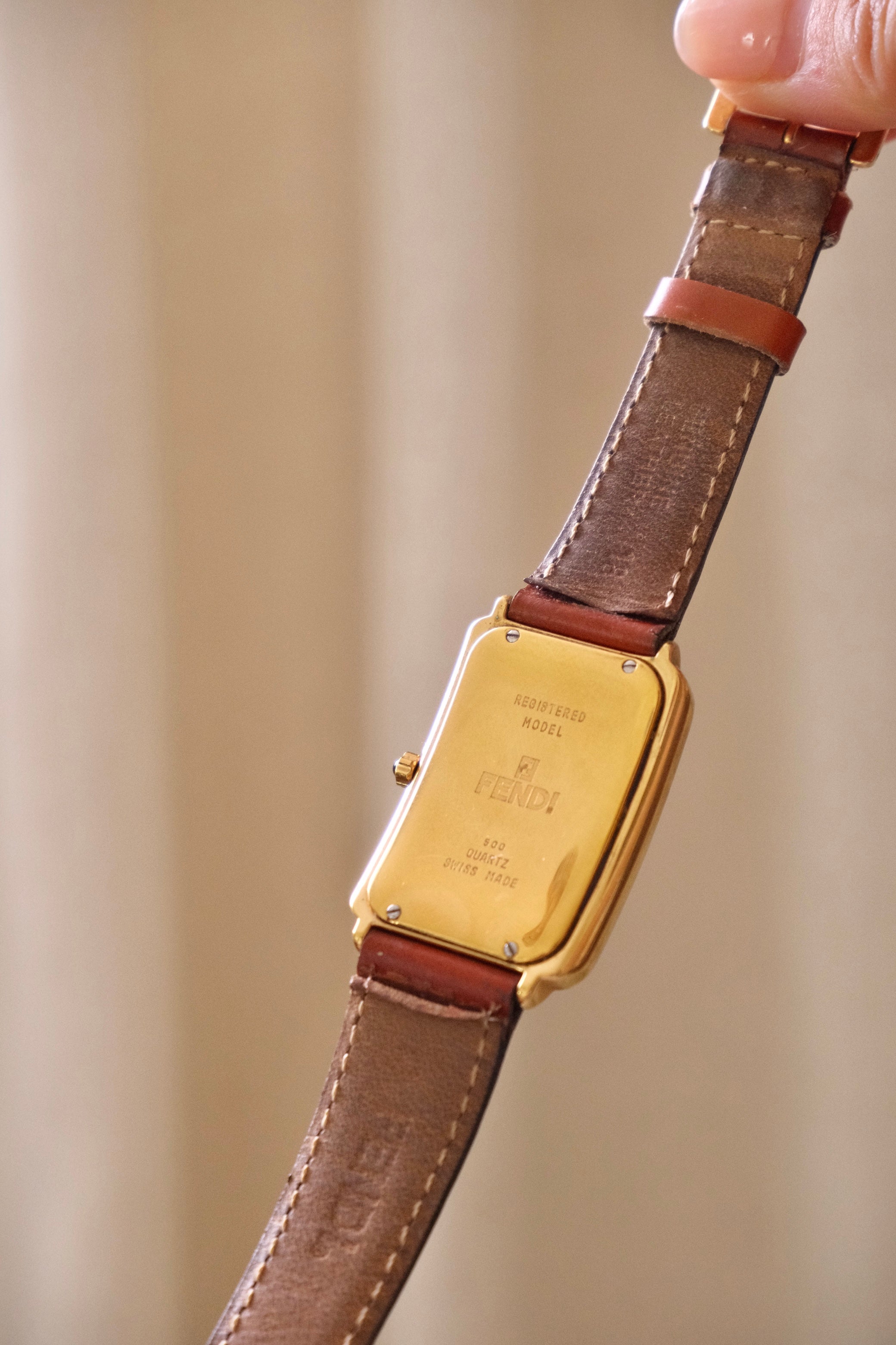 Vintage 90s Unisex Gold-Plated Fendi 500 Quartz Watch with Rectangular Tank-Style Dial