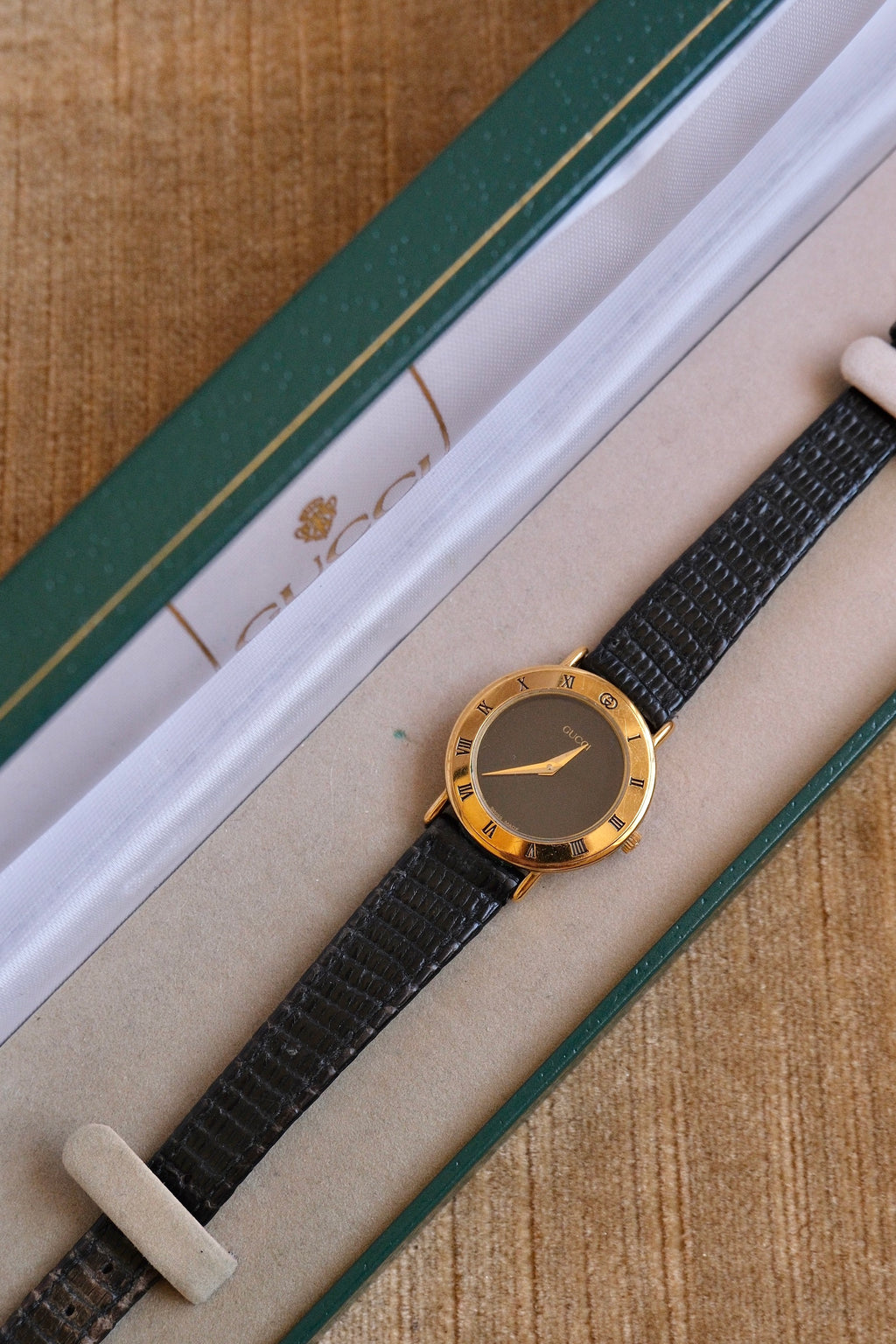 90s Ladies Gold-Plated Gucci 3000L Quartz Watch with Black Leather Strap in Box