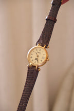 1994 Ladies Burberrys Gold Tone Round Watch with Date Brown Lizard Strap