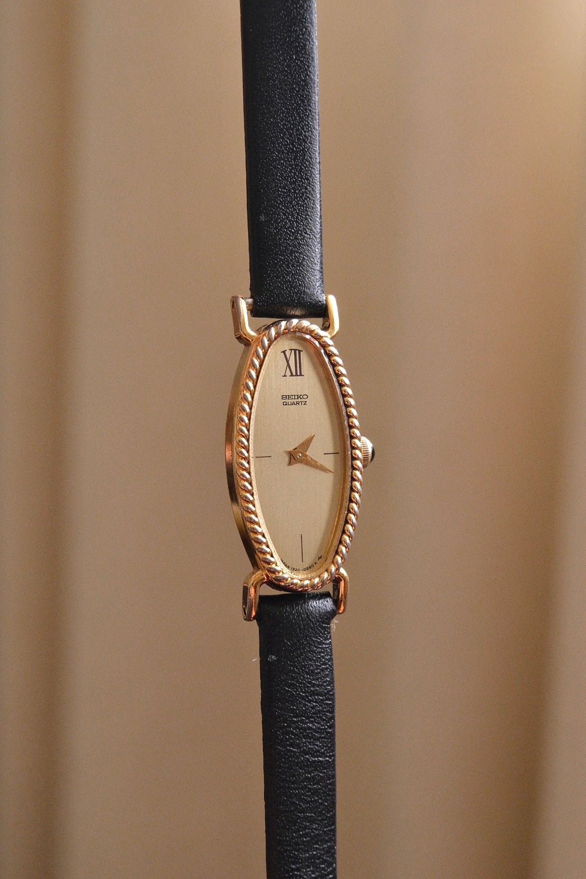Vintage 1980s Ladies' Gold-Plated Seiko Quartz Watch - Oval Champagne Dial Leather Strap