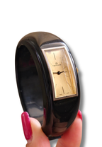Rare 1970s Hanowa Mage Swiss-made ladies bangle watch featuring a rectangular gold-tone dial Manual Wind