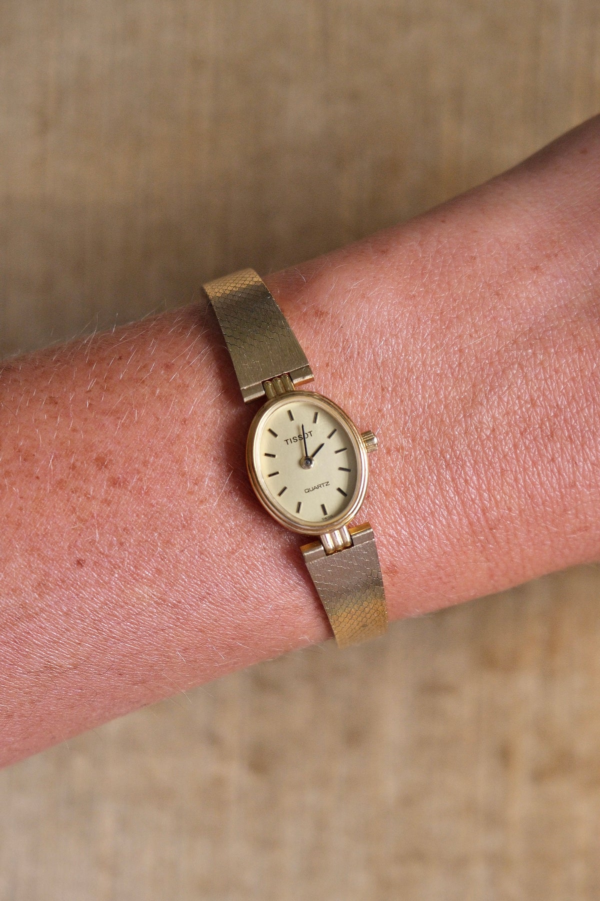 Vintage 1980s Tissot Ladies Gold Oval Watch - Swiss Quartz Cocktail Dress Wristwatch with Integrated Mesh Pattern Mesh Bracelet