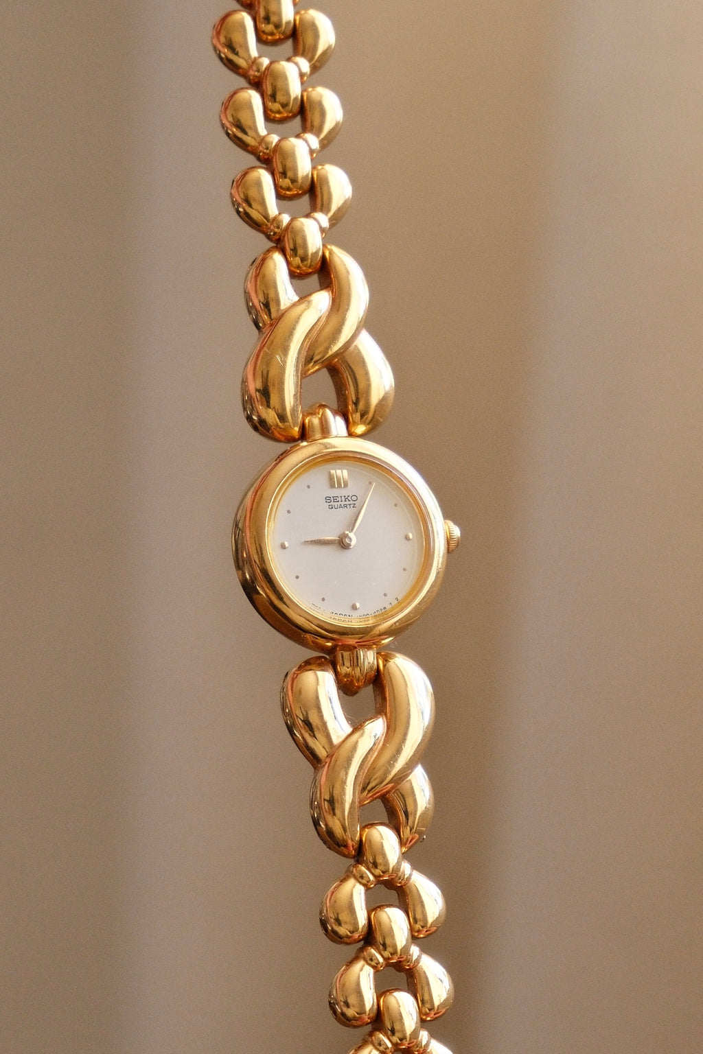 Vintage Ladies Gold Seiko Quartz Watch Featuring a Striking Chunky Intertwined Link Bracelet
