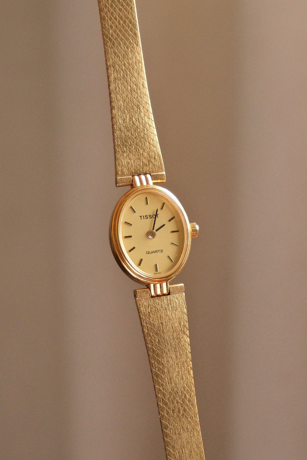 Vintage 1980s Tissot Ladies Gold Oval Watch - Swiss Quartz Cocktail Dress Wristwatch with Integrated Mesh Pattern Mesh Bracelet