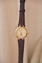 1994 Ladies Burberrys Gold Tone Round Watch with Date Brown Lizard Strap