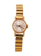 Vintage Timex Mechanical Ladies Gold Watch on a Stretch Watch Band Working