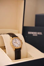 Ladies Raymond Weil Vintage Genève 9955 18k Gold Plated Quartz Watch With Authentic  Blue Cabochon Sapphire Crown with Box and Papers