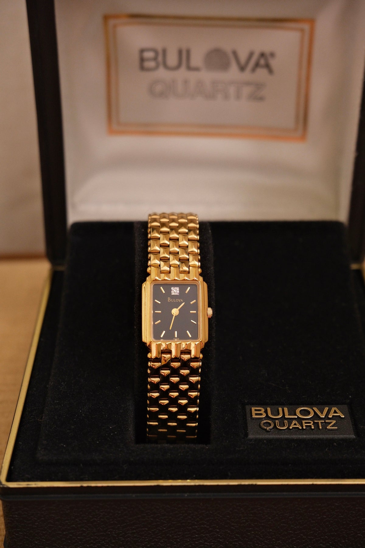 Vintage Ladies Gold Bulova Quartz Black Dial Tank Watch in Box Working