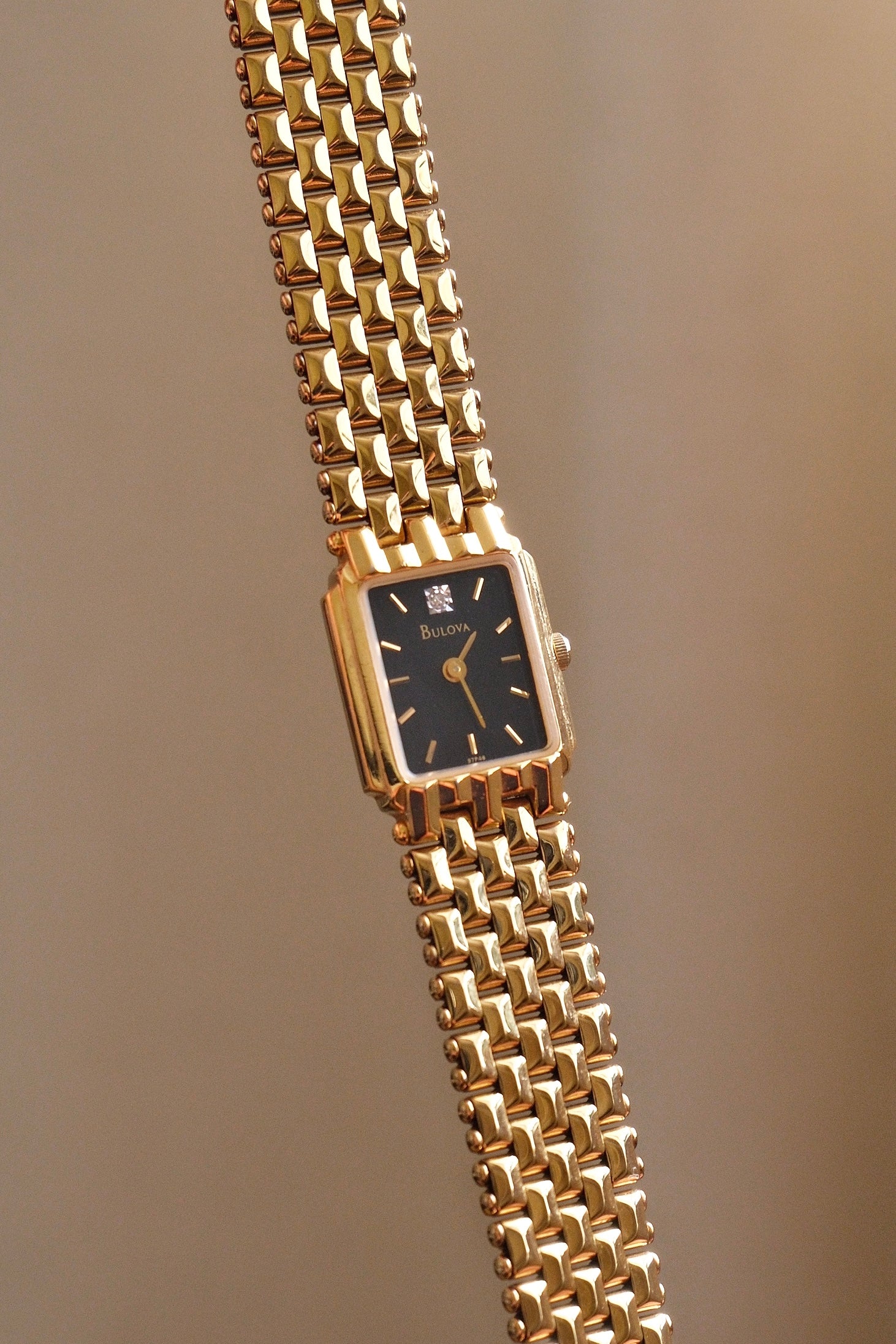 Vintage Ladies Gold Bulova Quartz Black Dial Tank Watch in Box Working
