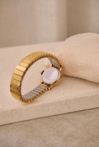 Vintage Timex Mechanical Ladies Gold Watch on a Stretch Watch Band Working