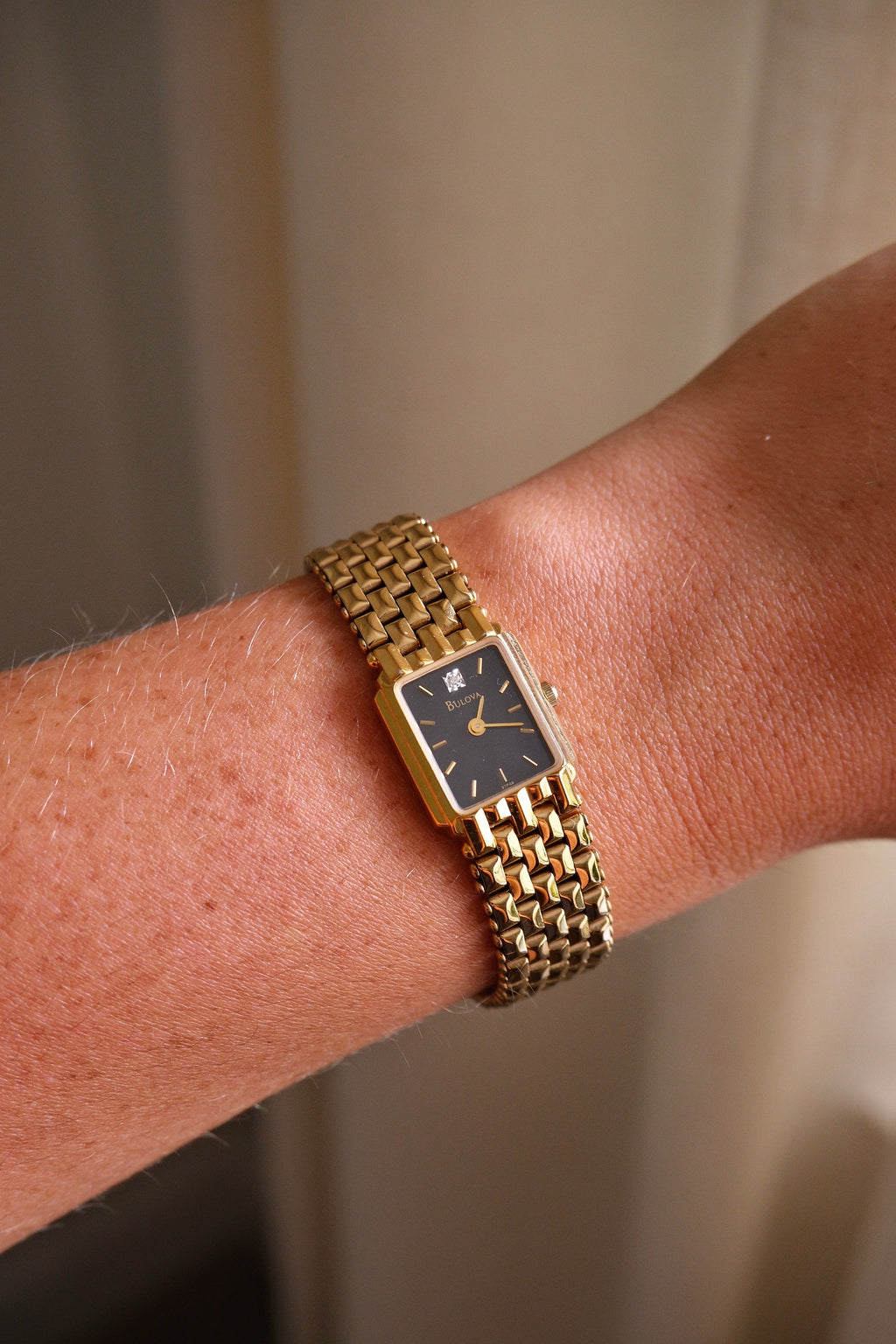 Vintage Ladies Gold Bulova Quartz Black Dial Tank Watch in Box Working