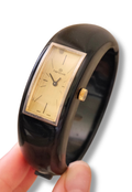 Rare 1970s Hanowa Mage Swiss-made ladies bangle watch featuring a rectangular gold-tone dial Manual Wind